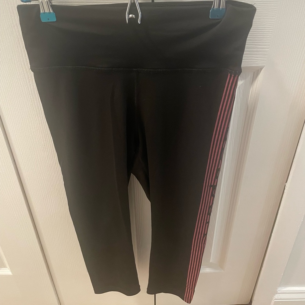 Black and pink Bebe Sport Striped Leggings